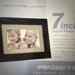 Pandigital 7" Photo Frame DPF70-2 128MB Black/cherry Display. Fixed Price $12.99.