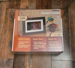 Smartparts Frame Wood Digital Picture 7.0" SPX7E Holds 2000 Images. Fixed Price $19.99.