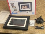 Hp DF780A4-18 7" Black Wood Digital Picture Frame With Interchangeable Matters. Fixed Price $30.00.