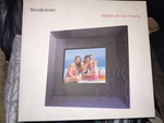 Brookstone Digital Photo Frame. Fixed Price $50.00.