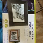 Gfm 7 Lcd Digital Photo 2 Interchangeable Frames Plays Music Movies Nib. Fixed Price $30.00.