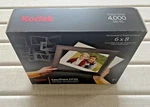 Kodak Easyshare D725E 7" 6X8 Digital Picture Frame 4,000 Photos -new. Fixed Price $17.95.