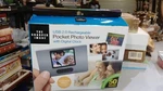 The Sharper Image Pocket Photo Viewer Usb 2.0 Rechargeable With Digital Clock. Fixed Price $9.99.