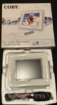 Coby Model DP-562 5.6 Digital Photo Frame MP3 Player White & Black Music Video. Fixed Price $13.00.