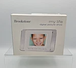 Brookstone My Life Digital Picture Show Photo Frame With 3" Screen. Fixed Price $17.99.