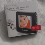 Brookstone My Life Digital Keychain 1.5" Black Usb Stores 100 Photos. Fixed Price $9.99.