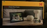Kodak Classic Digital Photo Frame CF102P Wifi Enabled 10.1 Inch Display. Fixed Price $75.00.