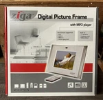 Ziga Photo Digital Picture Frame & MP3 Player With Remote. New In Box. Fixed Price $19.99.