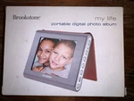 Brookstone My Life 3.5" Portable Digital Photo Album Picture Frame Brown. Fixed Price $20.00.