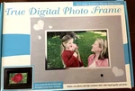 True Digital 7" Photo Frame. Just Insert Your Memory Card! Remote Included!. Fixed Price $23.99.