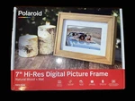 7" Digital Picture Frame With Mat Natural Wood - Polaroid. Fixed Price $23.00.
