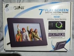 Giinii 7" Flat Screen Digital Picture Frame Model GT-7AWP-1 New Open Box. Fixed Price $14.85.