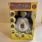 Photokinz, Percy The Penguin - Huggable Digital Frame New Sealed. Fixed Price $25.76.