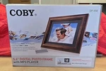 Coby DP-558 5.6" Digital Photo Frame. Fixed Price $24.99.
