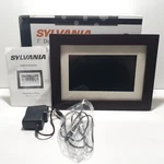 Sylvania 7" Digital Clock Photo Frame SDPF785. Fixed Price $14.99.