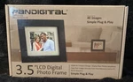 New Pandigital 3.5 Inch Lcd Photo Frame PAN3502W02 Upc: 843967035025. Fixed Price $17.99.
