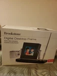 Brookstone My Life Digital Desktop 3.5" Frame New Clock Pen Calendar 1000 Photos. Fixed Price $29.99.