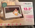 Aluratek Digital Picture Frame 13.3 Interchangeable. Fixed Price $63.95.