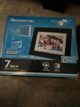 Pandigital 7" Clock Calendar Photo Frame - Up 4000 Images. Fixed Price $7.50.
