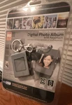 Innovage Digital Photo Album Keychain Usb Rechargeable Mpn 1620121. Fixed Price $20.00.