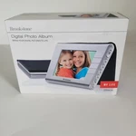 Brookstone Digital Album Black Stores 4,000 Photos In Box. Fixed Price $14.99.