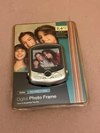 New Vivitar Digital Photo Frame 2.4" Screen DPF30 Desktop Portable Slide Shows. Fixed Price $16.99.