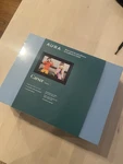 New Aura Home Carver 10" Digital Wifi Picture Frame Gravel W/ White Mat Sealed. Fixed Price $115.00.