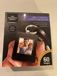 Sharper Image Usb 2.0 Digital Keychain New Box Ultra Slim 60 Photos. Fixed Price $12.99.