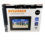 Sylvania SDPF757 7" Digital Picture Frame-open Box. Fixed Price $15.00.