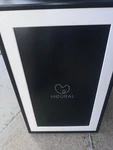 Meural Canvas 27" Leonora Black Smart 29"X19" Digital Frame. Fixed Price $300.00.