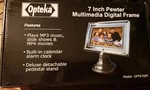 Opteka Multimedia Digital Pewter Frame Plays MP3 Slide Shows MP4 Movies Alarm. Fixed Price $20.00.