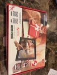Akimart 10.1 Smart Wifi Digital Photo 32GB Frameo App ZN-DP1002. Fixed Price $28.00.