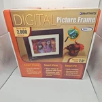 Smart Parts Sync Pix SPX7E 7" Lcd Digital Picture Frame Built-in Speakers. Fixed Price $18.49.