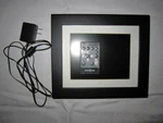 Digital Photo Frame - Insignia DPFO812W Display Size X 6.5. Fixed Price $18.00.