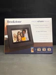 Brookstone Photoshare 8 Smart Digital Frame. Fixed Price $63.99.