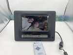 Polaroid Digital Photo Frame With Built-in Weather Station. Fixed Price $19.99.