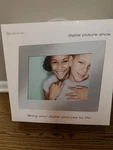Brookstone My Life 10" Digital Picture Show Frame, Brushed Aluminum Finish, New. Fixed Price $25.00.
