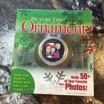 Picture This Digital Ornament Holds 50 Photos New In Box. Fixed Price $14.95.