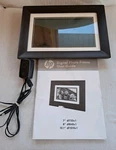 Hp DF1010V1 10.1" Digital Picture Frame With User Guide. Fixed Price $14.95.
