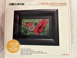 Curtis 7" Digital Photo Frame 16MB Built In Memory Clock & Calendar Function. Fixed Price $22.99.