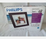 Philips Digital Photoframe 10.4" Lcd Panel Mocha Wood SPF3400C. Fixed Price $33.00.