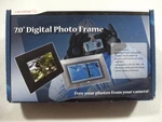 Nextar 7-INCH Digital Photo Frame With Black & Silver New Sealed Box. Fixed Price $15.00.