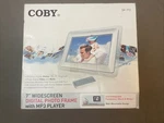 Coby DP-772 7" Digital Picture Frame. Fixed Price $15.00.