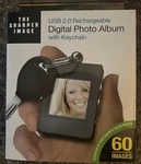 The Sharper Digital Photo Album Keychain Usb 2.0 Rechargeable 60 Images. Fixed Price $10.00.