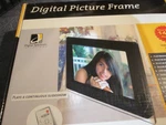 Nuvue 700 Plus Digital Spectrum Frame Holds 1400 Pictures- New. Fixed Price $22.50.