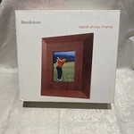 Brand New Brookstone 6IN Lcd Digital Photo Frame Rosewood Color. Fixed Price $45.00.