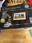 Sylvania 10" Led Digital Photo Frame With Wood Look Finish. Fixed Price $30.75.