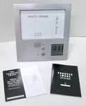 Sharper Image Talking Picture 2-WAY Frame W/ Message, Alarm Clock & Temperature. Fixed Price $15.99.