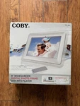 Coby DP888 Digital Photo Frame 8" With MP3 Player. Fixed Price $22.99.