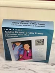 Sharper Image Talking Picture 2-WAY Frame W/ Message, Alarm Clock & Temperature. Fixed Price $27.00.